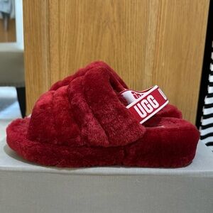 Red women’s fluff slides with strap